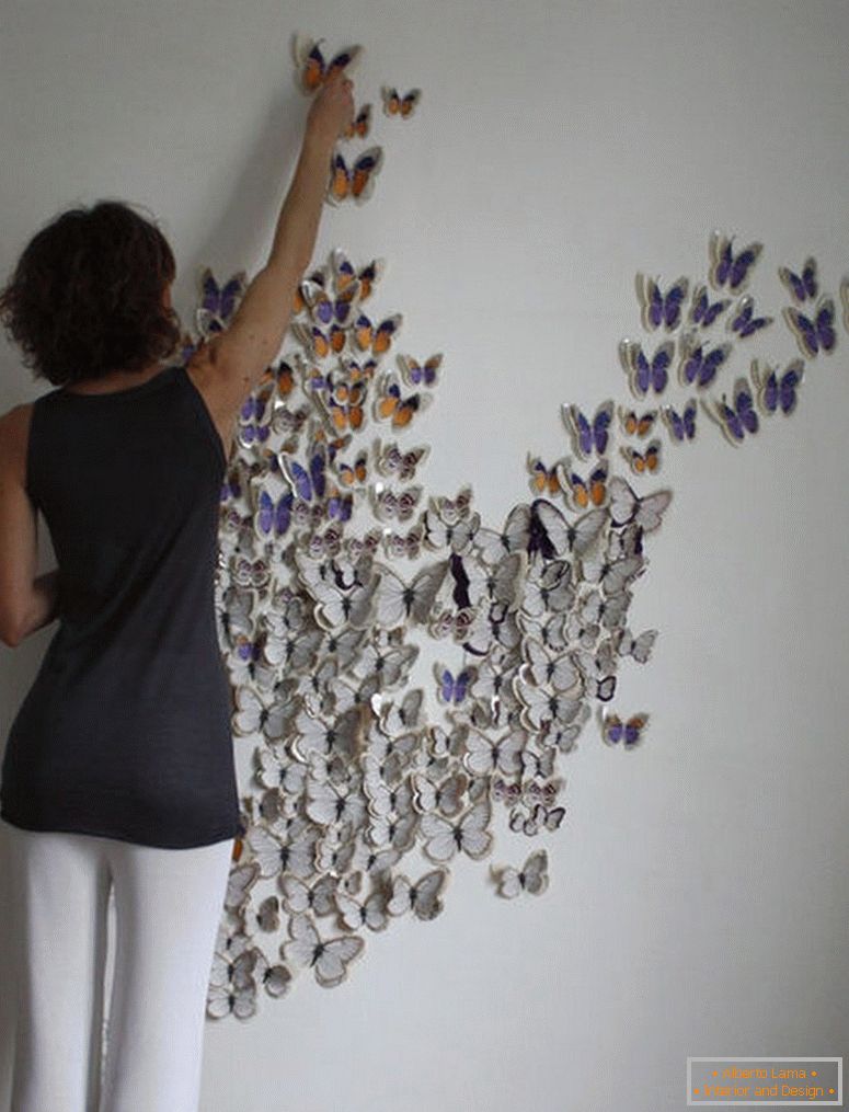 Přitiskněte motýl na zeď