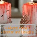Krvavé svíčky s hřebíky a rukama