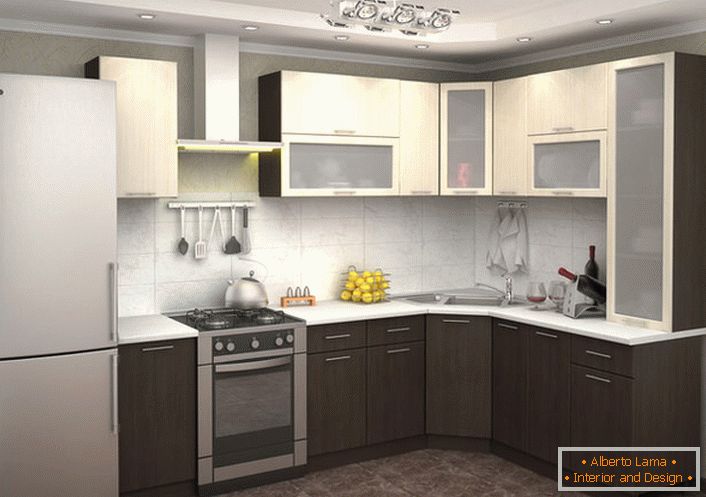 Kuchyňka ve tvaru L s mnoha závěsnými skříněmi je ideálním řešením pro všechny praktické hostesky.