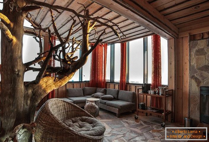Obývací pokoj ve venkovském stylu. Klasický styl: kámen a lehké dřevo.