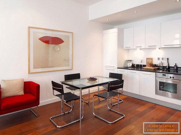 Stylová kuchyň s akcenty červené. Minimalistické styl je win-win možnost pro design studio apartmány. 