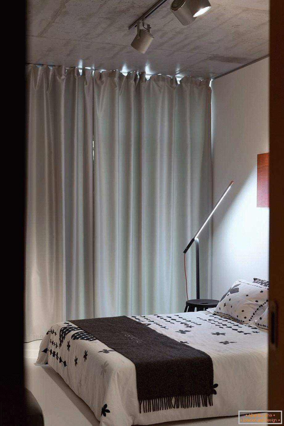 Ložnice malého apartmánu s jednou ložnicí v Kyjevě