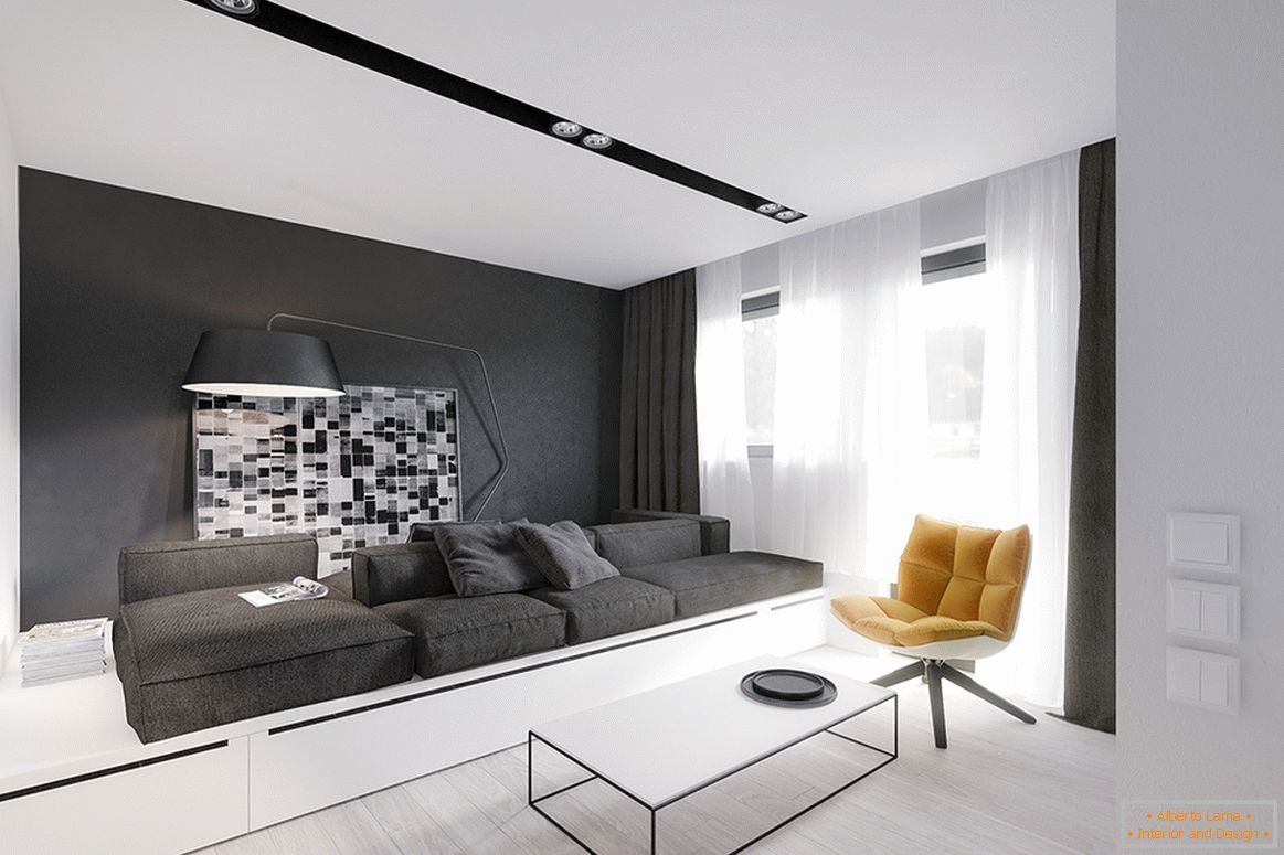 Interiér malého bytu v černé a bílé barvě