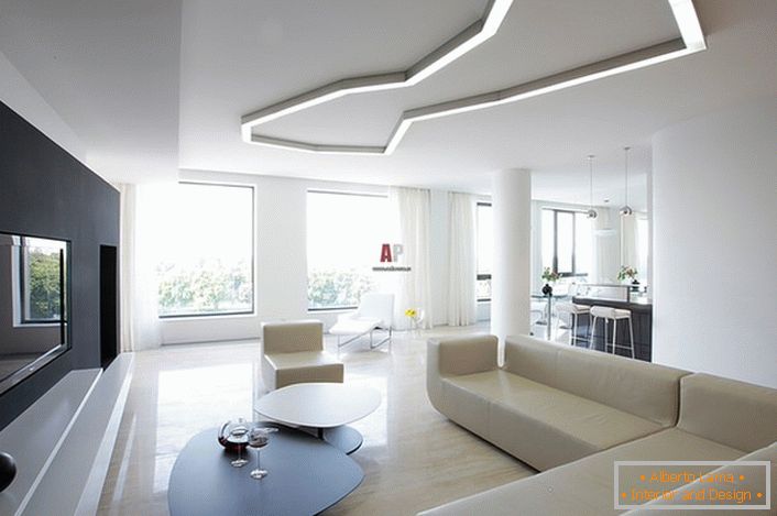 Příklad správného výběru osvětlení pro obývací pokoj ve stylu minimalismu. V souladu s požadavky stylu při tvorbě vnitřních geometrických tvarů a přísných linií jsou používány.