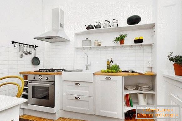 Фото необычного aнтерьера кухнa в белом цвете