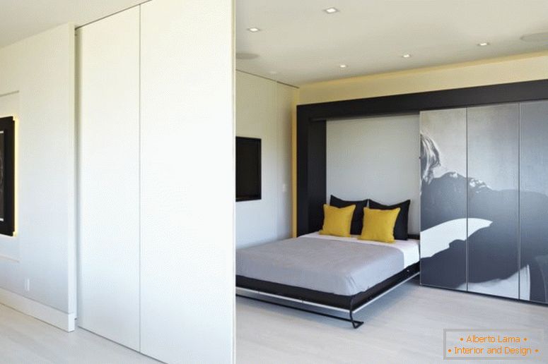 vestavěné lůžko-malé byty-interiér-design-řešení-rozdělovací-zónování-a-skryté-skříň-spací_bedroom-skryté-tv-furniture_bedroom_black-bedroom-furniture- two-apar