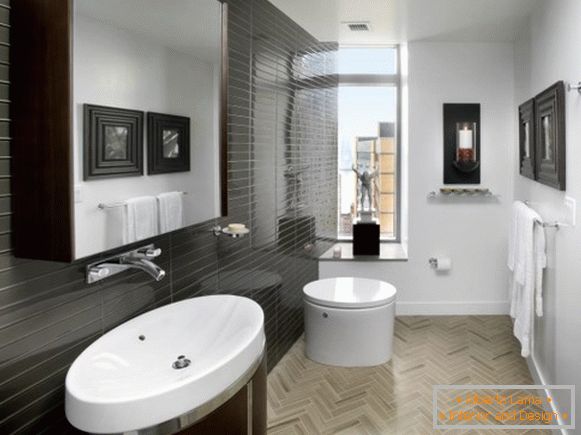 Moderní koupelna s černými dlaždicemi