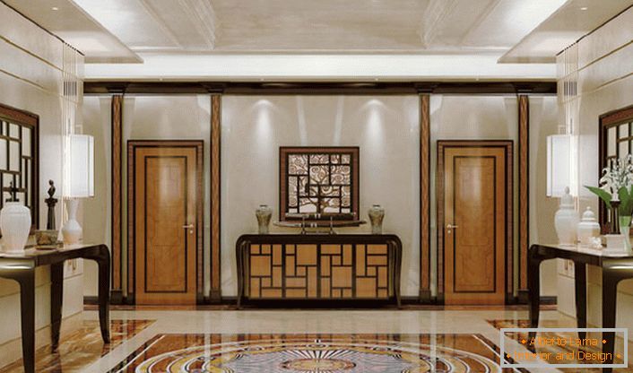 Luxusní dekorace haly ve stylu art deco s klasickými poznámkami. Stylový a elegantní interiér s nadbytkem dekorativních detailů vypadá draho a náročný.
