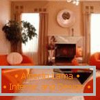 Oranžová křesla a pohovka v obývacím pokoji