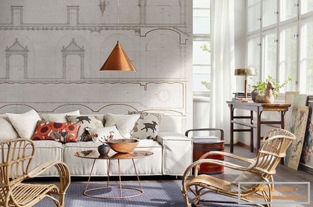Moderní obývací pokoj ve světlých barvách s proutěnými židlemi