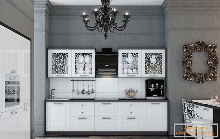Kuchyně je vyrobena ve výhodné kombinaci kontrastní bílé a černé barvy. Lesklý povrch elegantně zapadá do interiéru v neoklasicistním stylu.