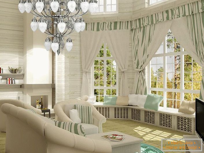 Světlý obývací pokoj v neoklasicistním stylu. Útulný a současně funkční prostor. Zvláštní zájem mají rozsáhlé parapety zdobené polštáři.