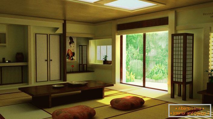 O přítomnosti japonského minimalismu v obývacím pokoji ve venkovském domě se vypráví správný nábytek. Nízká stolka je ideální pro pití domácího čaje. 