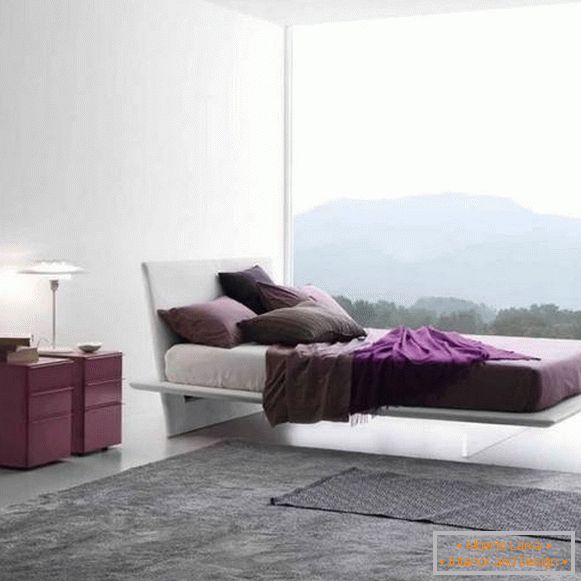 Moderní postel s průhlednými nohami