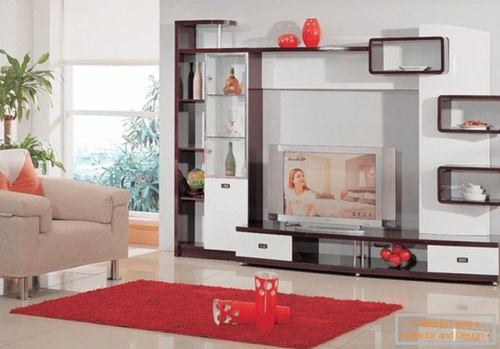 Moderní moderní nábytek pro prostorný světlý obývací pokoj. Změny času, změny materiálů a známé linie zůstanou.