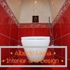 Červený a bílý design toalety