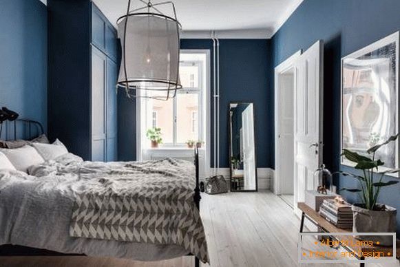 Fotografie ložnice v moderním stylu a modré barvě