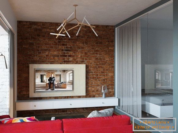 Obývací pokoj a ložnice za skleněnou přepážkou