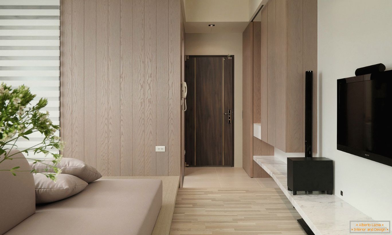 Dřevěná dekorace v interiéru malého jednopokojového bytu